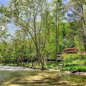 River cabin on 50 acres of private mountain land